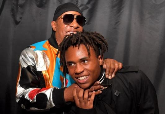 Kailand Morris with his father.